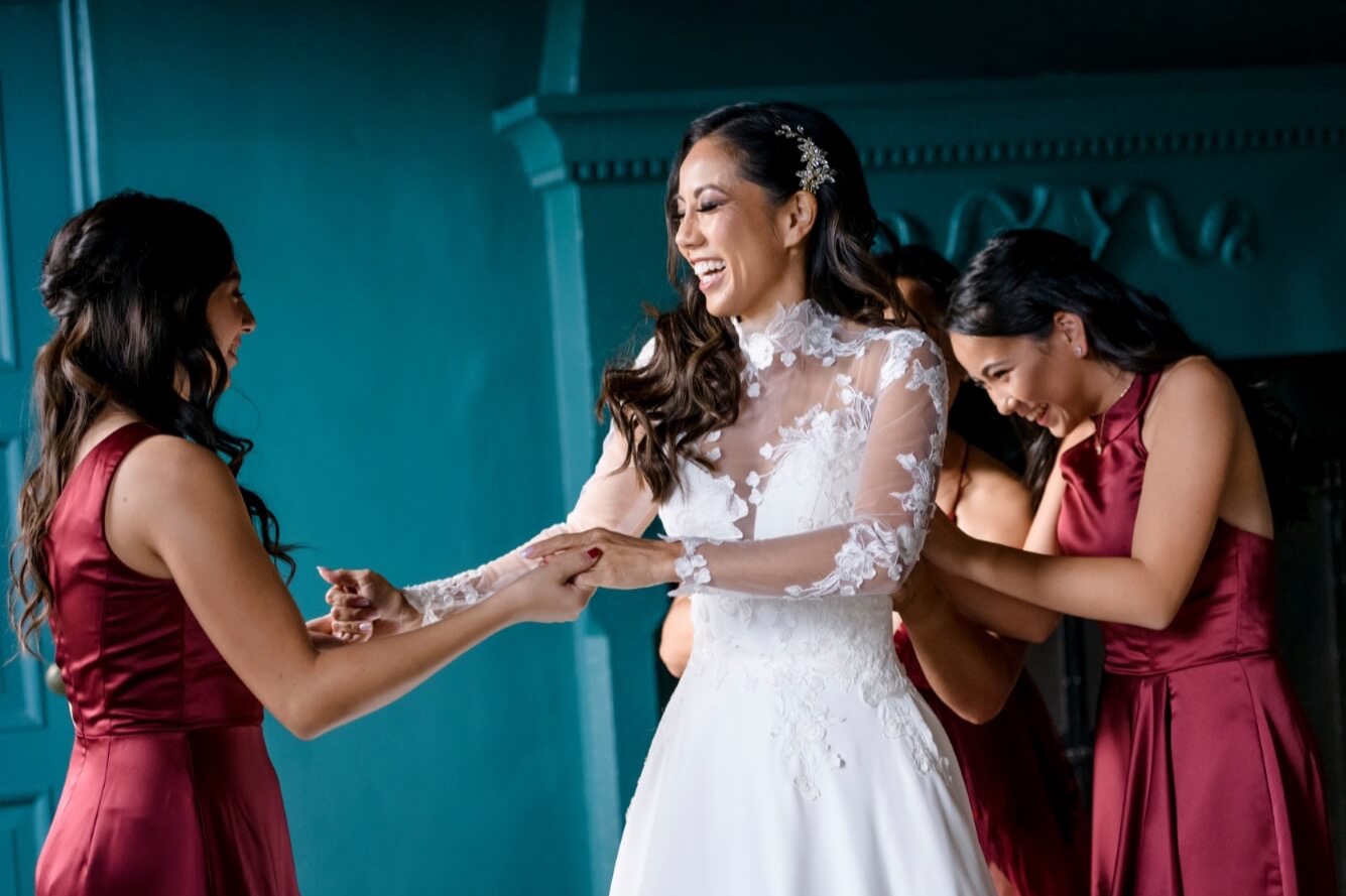 bride and bridesmaids getting ready