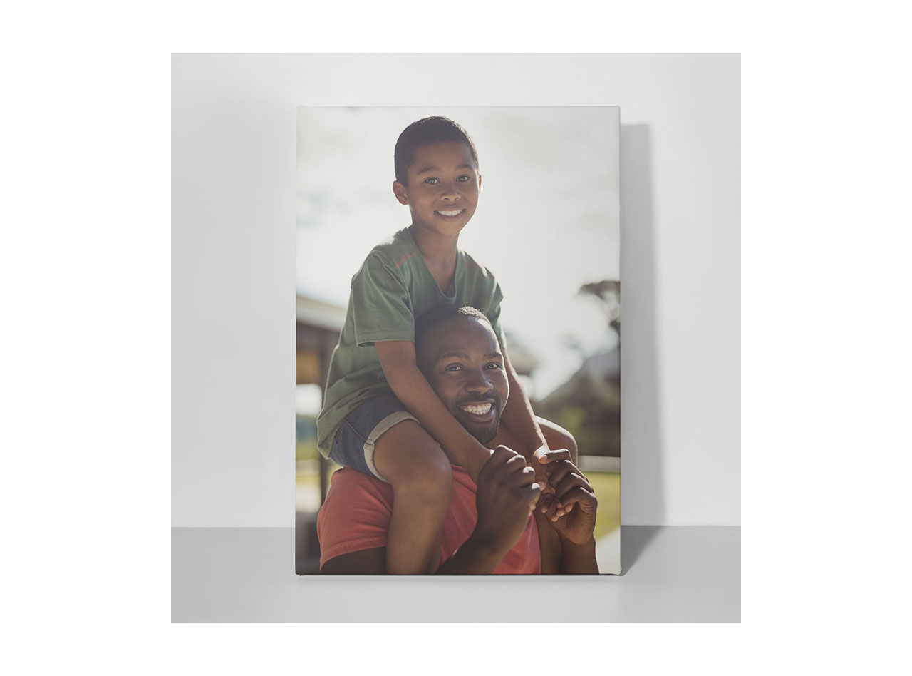 A canvas print picturing a father sharing a heartfelt moment with his young son