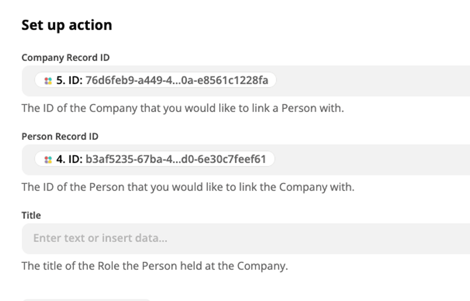 An action step in Zapier shows the linking of both the person and company records created in prior steps