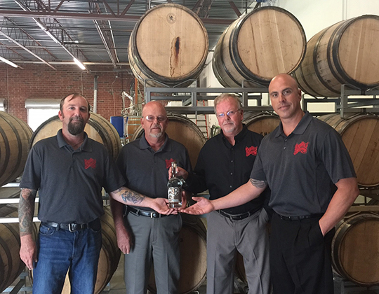 Van and John Williams reopened the distillery in 2015 with their sons Matt and Zeb.