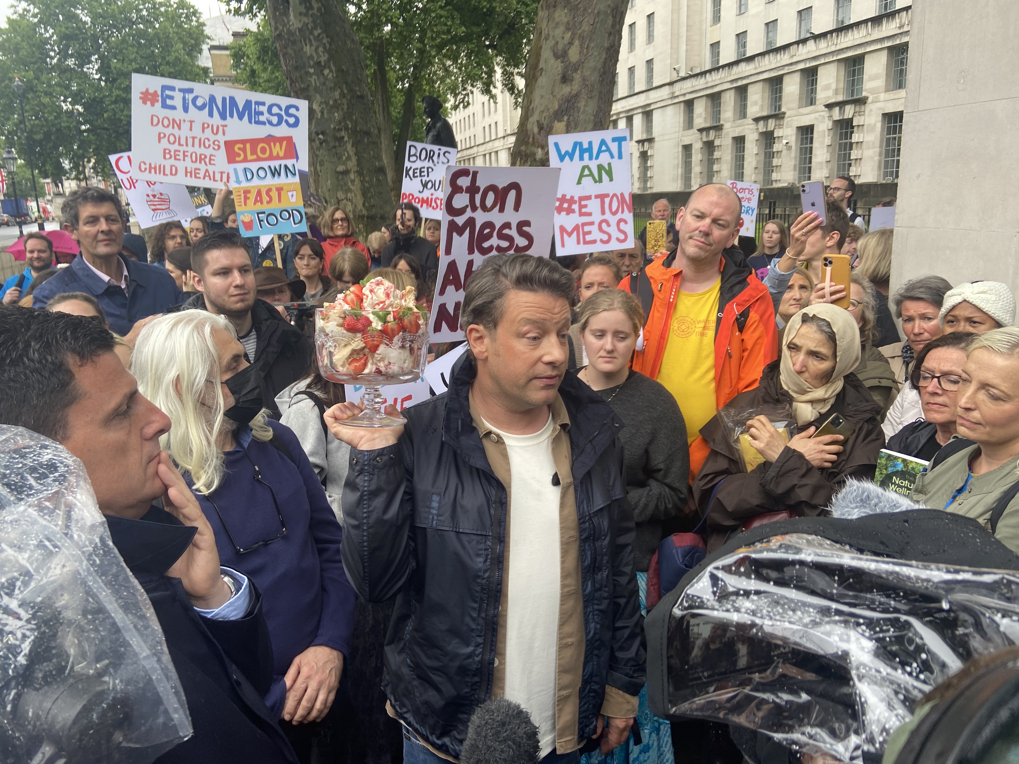 Jamie Oliver surrounded by supporters
