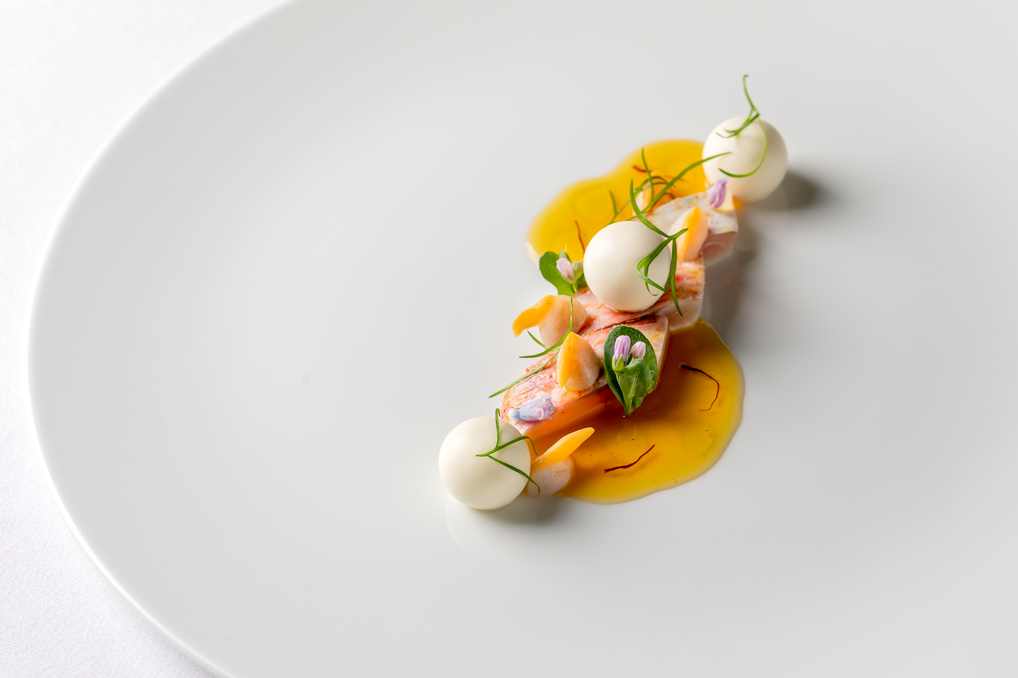 Escabeche of red mullet with bouillabaisse consomme Cafe Royal. Credit: Justin De Souza