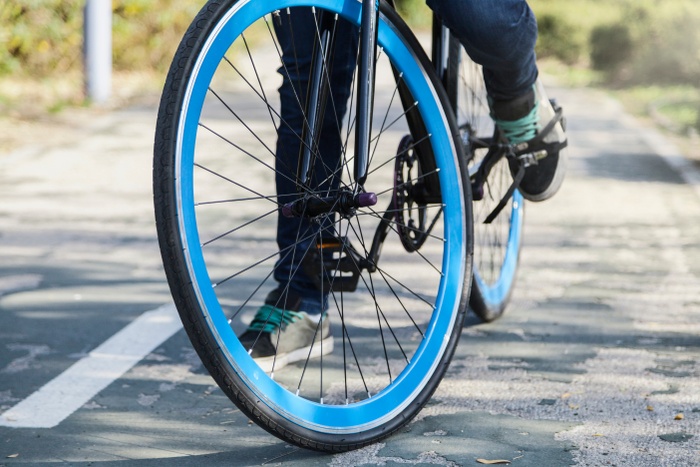 crop-man-riding-bicycle.jpg