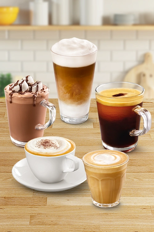 Various coffee drinks crafted by TASSIMO, including espresso, cappuccino, latte, americano, and mocha.