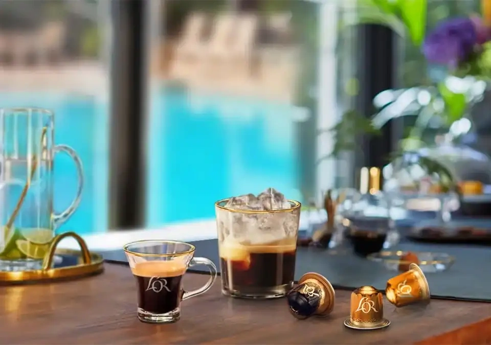 Poolside coffee setup with L'OR Espresso capsules for a bespoke coffee experience.