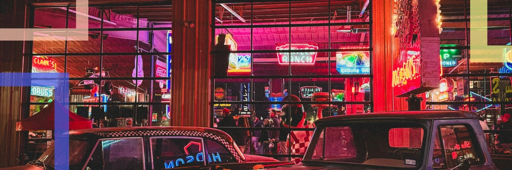 A photo of the inside of the restaurant covered in neons