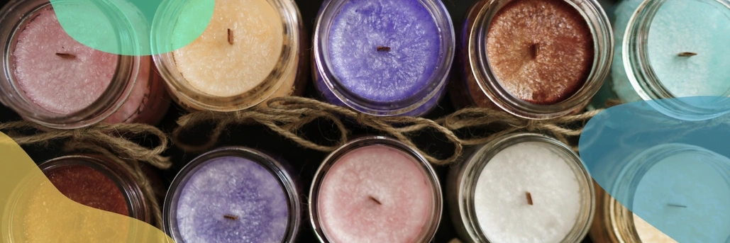 Colorful candles in jars