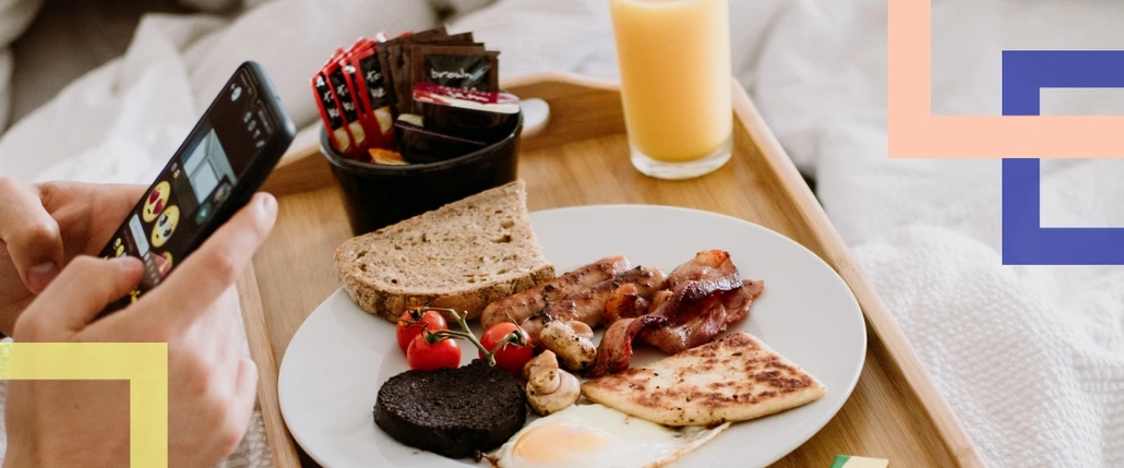 A person making a photo of their food 