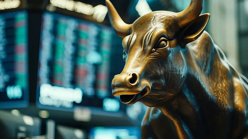 Bronze bull against market data screens