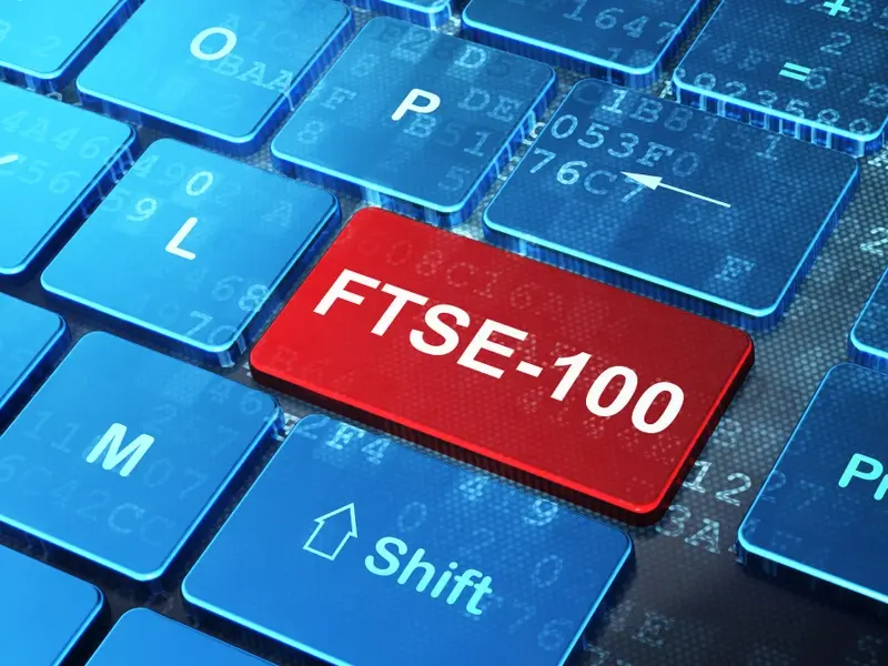 FTSE 100 red button laptop