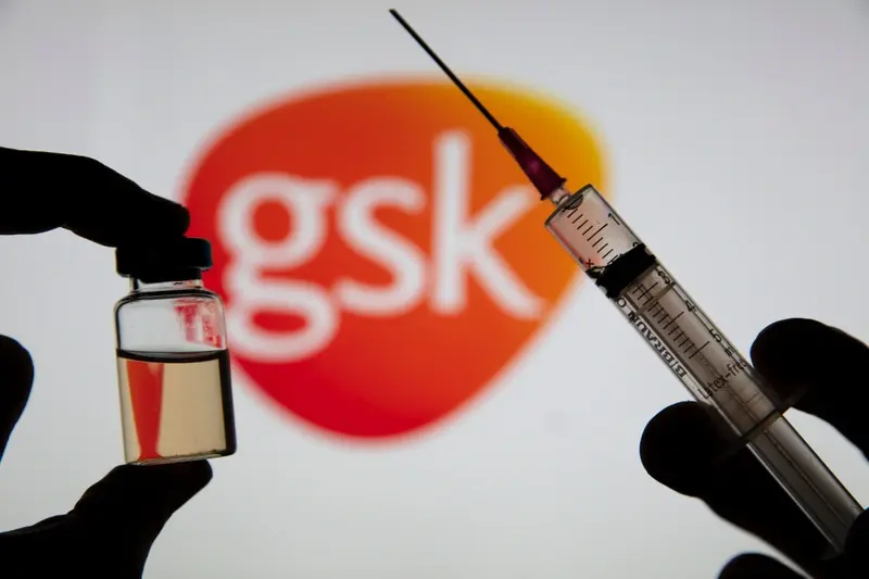 GSK sign with needle in foreground