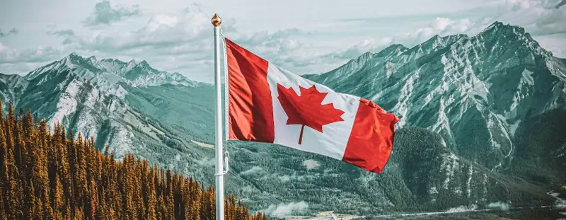 Canadian Flag with a mountain background