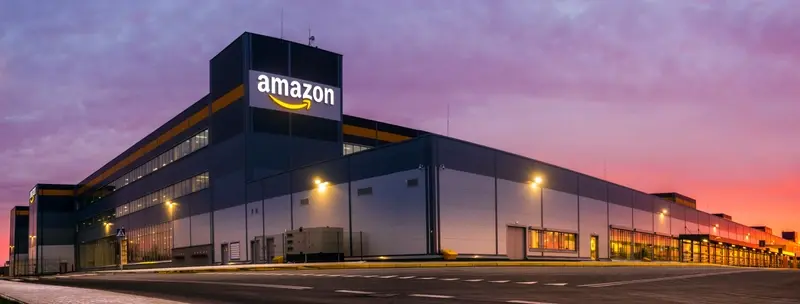 Amazon distribution centre at sunset