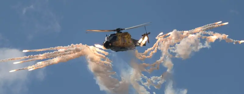 Helicopter, firing rockets