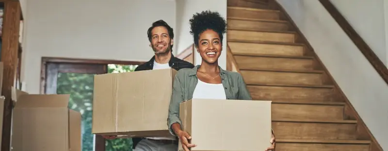 Couple with moving boxes