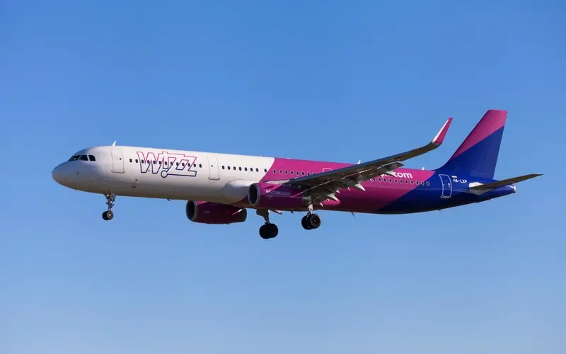 Photograph of Wizz Air plane in the air