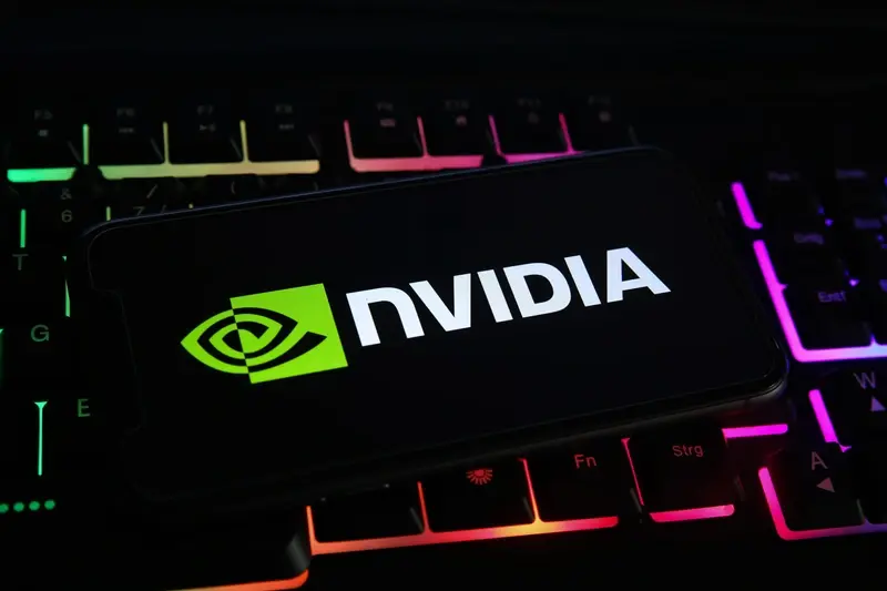 Nvidia brand name on smartphone against laptop keyboard