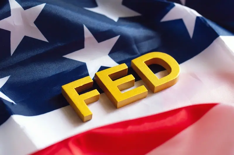 Gold text Fed on USA flag background