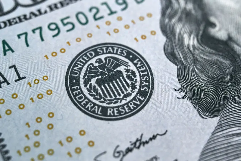 Federal Reserve stamp on $100 dollar bill