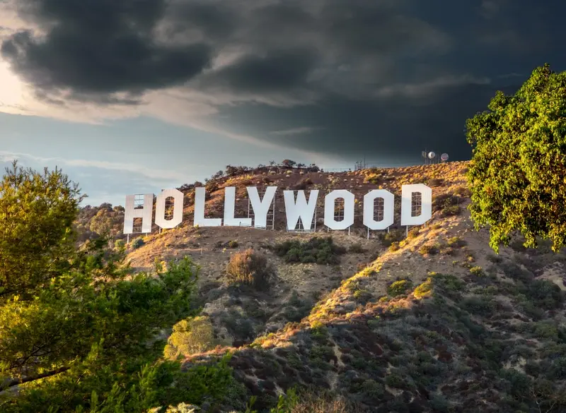 Dark clouds gathering over Hollywood Hills sign