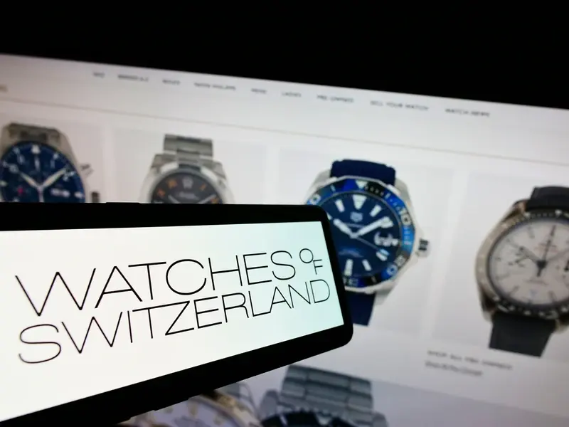 Watches of Switzerland logo on smartphone