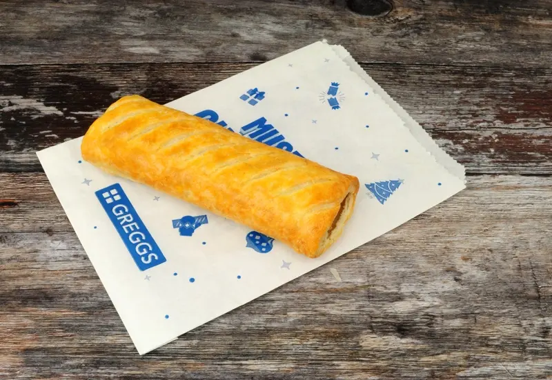 sausage roll and greggs paper bag