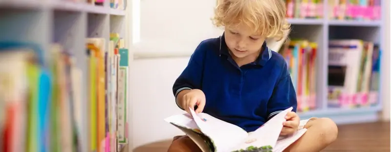 Child reading a book