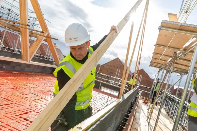 Builder on a housing site