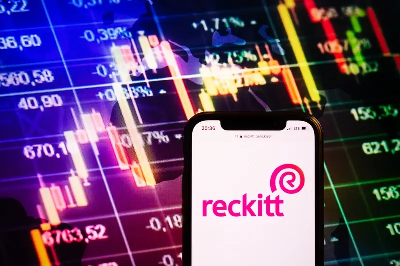 Reckitt logo on stock exchange background