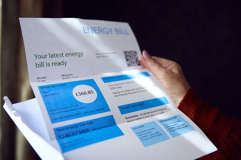Customers holding energy bill
