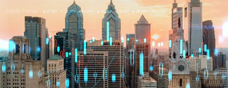 Skyline with stocks going up and down graphic overlayed