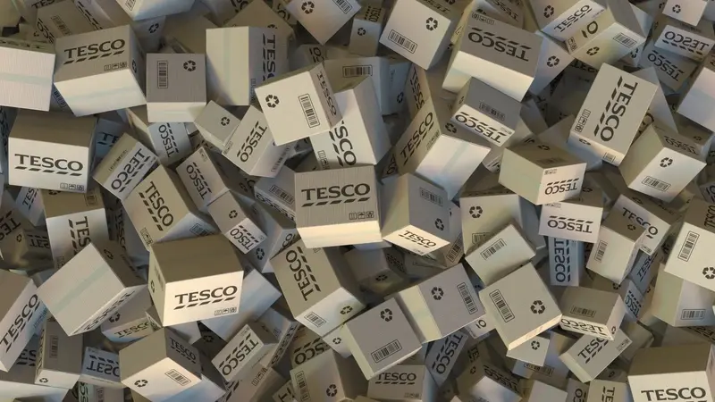 Tesco logo on piled boxes