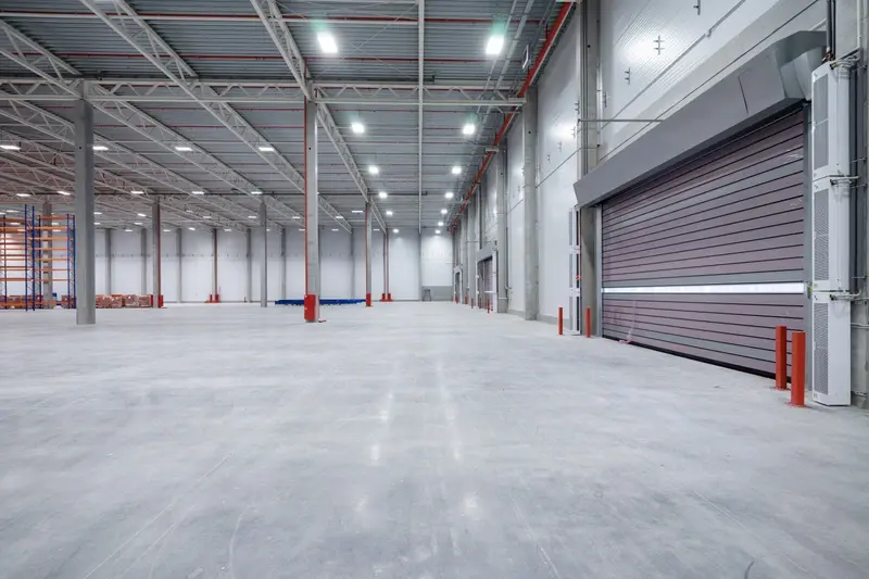 Large empty warehouse with ultra-flat flooring