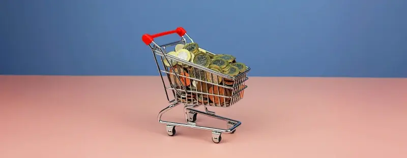Shopping trolley full of pound coins