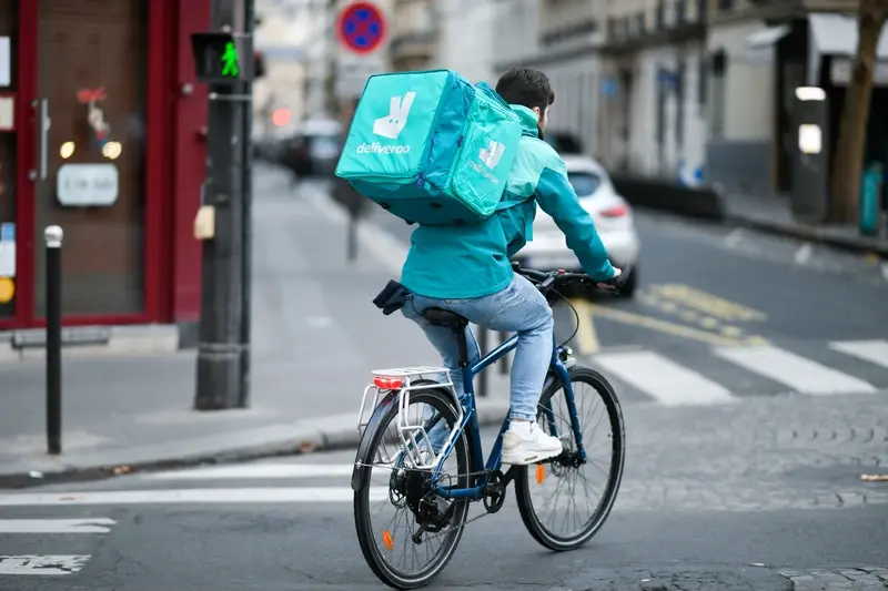 Deliveroo rider out on delivery in London