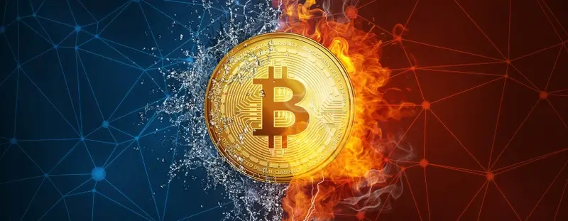 Bitcoin, one side freezing, one side on fire