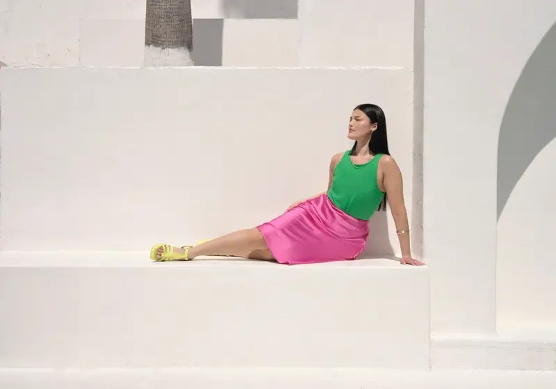 Model wearing brightly-coloured outfit from N Brown