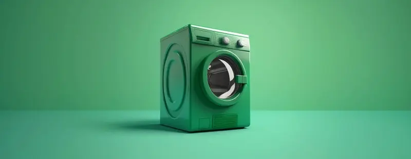 Green washing machine against a green background