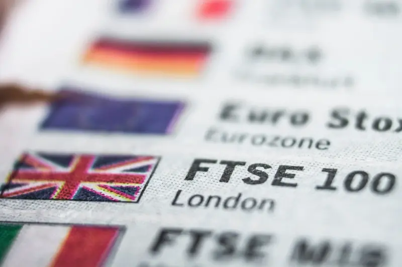 FTSE 100 on UK flag background