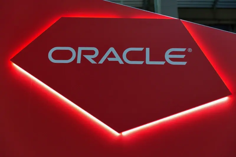 Oracle backlit sign in red