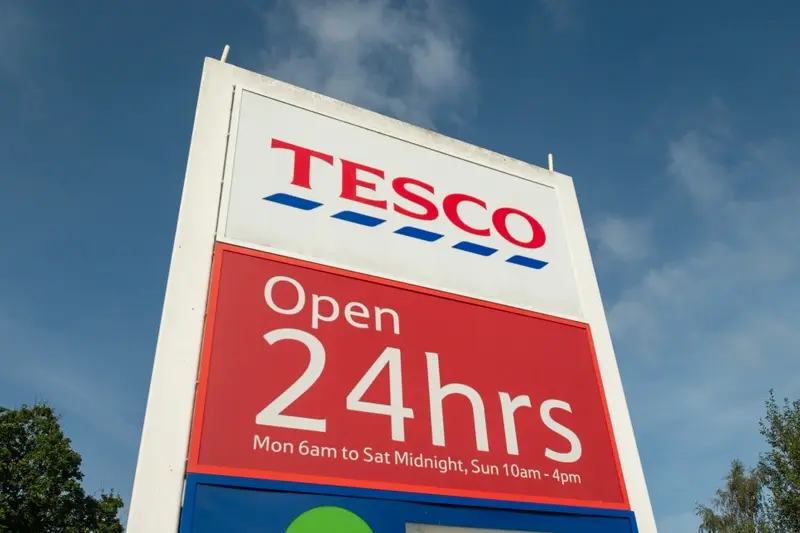 24-hours Tesco store opening sign