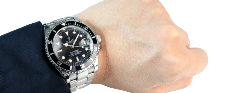 Man wearing a Rolex watch
