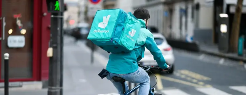 Deliveroo driver on a bike