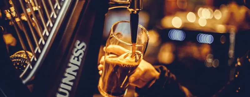 Pint of Guinness being poured