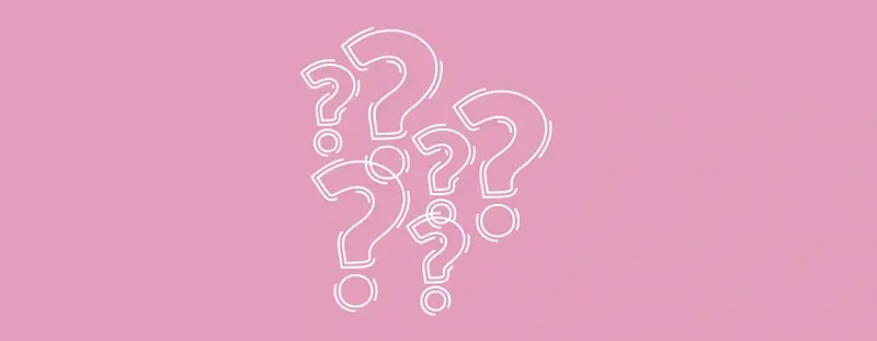 pink background with white question marks