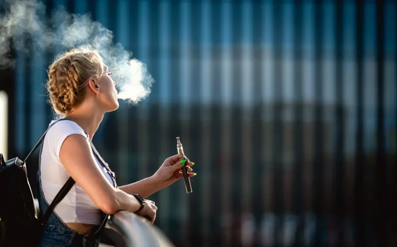 Woman vaping