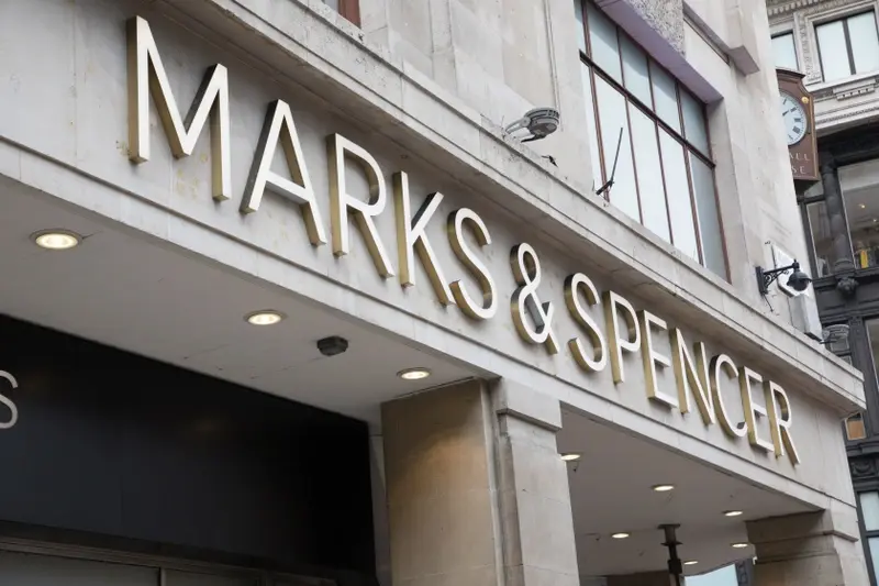 Marks and Spencer sign on the wall 