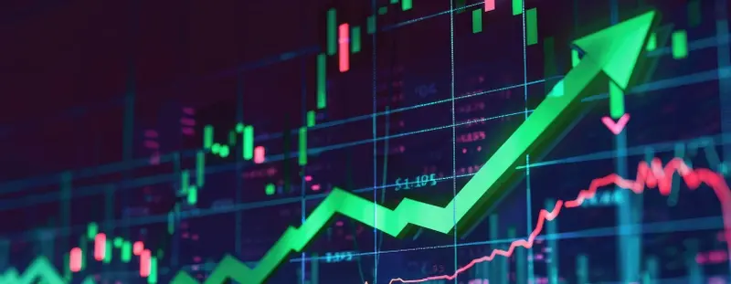 Stock market and green arrow pointing up