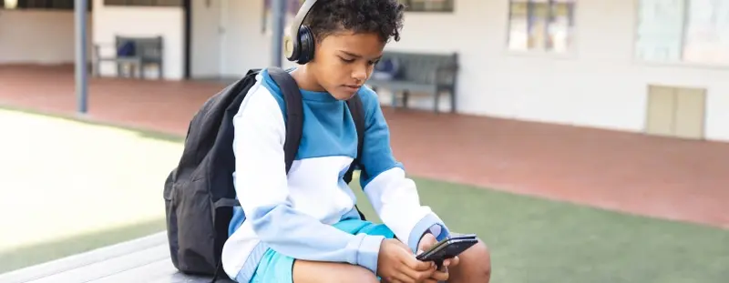 Teenage boy on smartphone