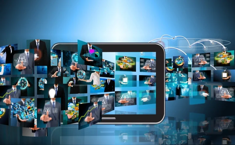 Picture showing various screens with images travelling through a tablet screen
